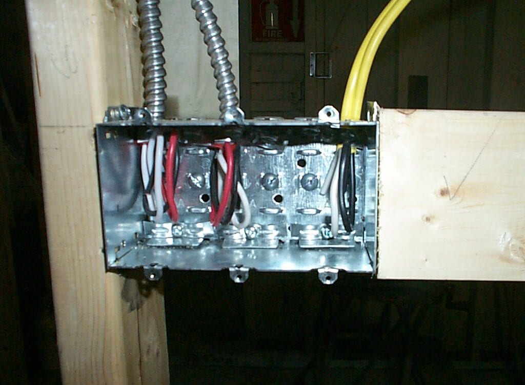 Guelph Residential Electrician installing new switch boxes.